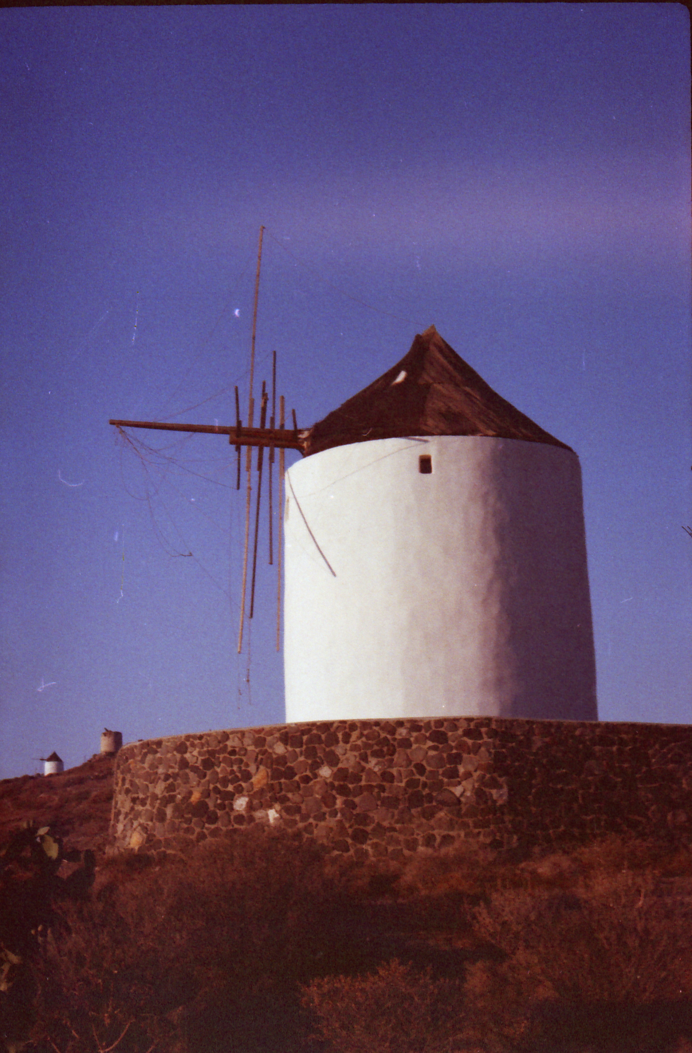 A photo of a white windmill